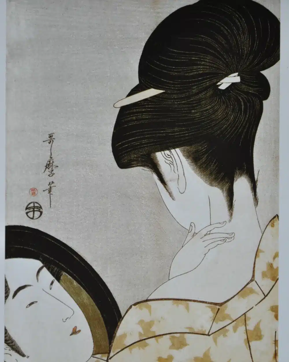 Estampe de Kitagawa Utamaro, femme se poudrant le cou : la toilette dans le Japon d'Edo